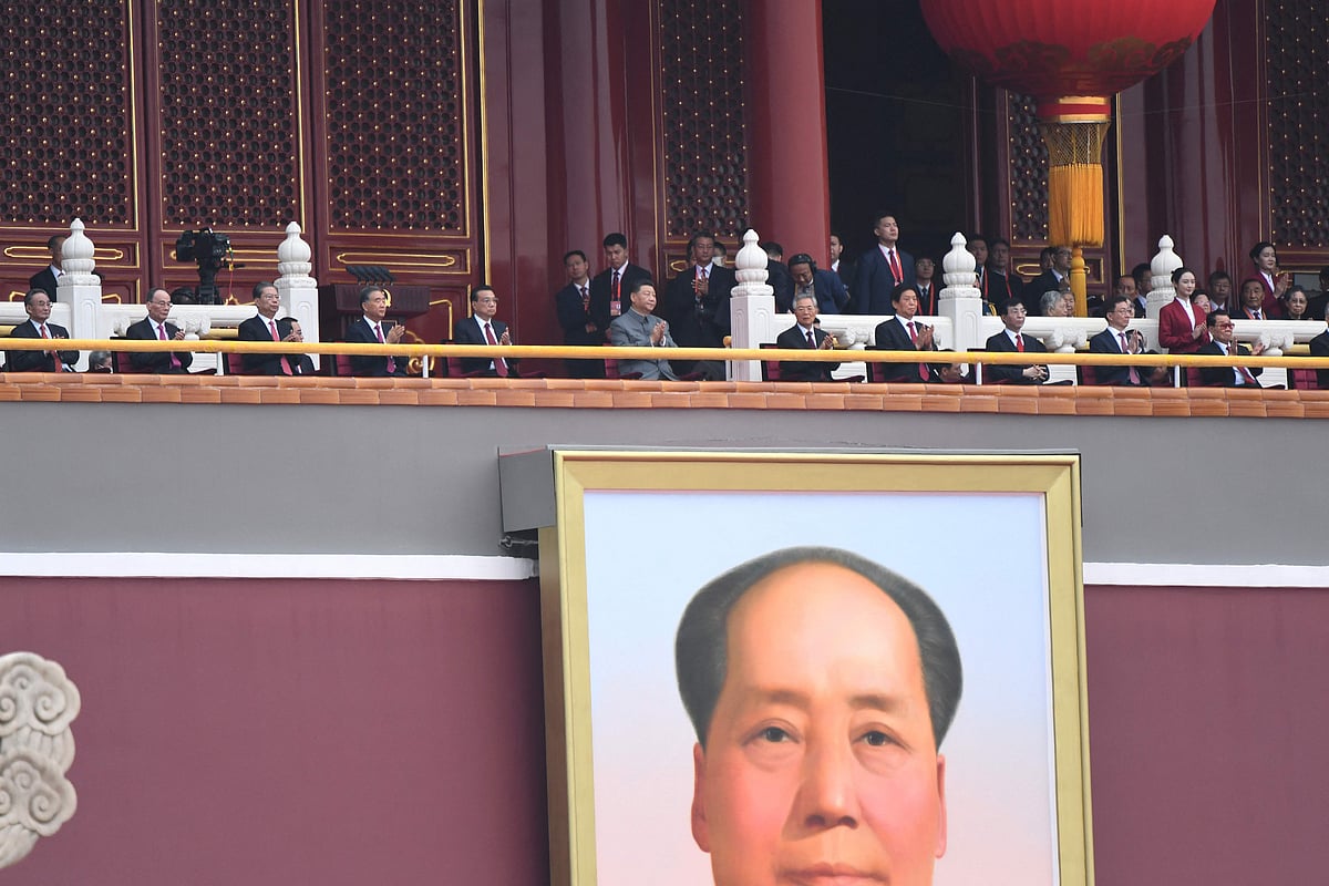 Chinese President Xi Jinping (C) attends the celebration of the 100th anniversary of the founding of the Communist Party of China at Tiananmen Square in Beijing on July 1, 2021.