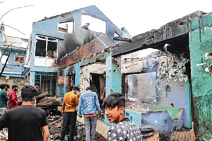 A view of a house damaged in an encounter between the security forces and militants in Pulwama, south Kashmir. 	