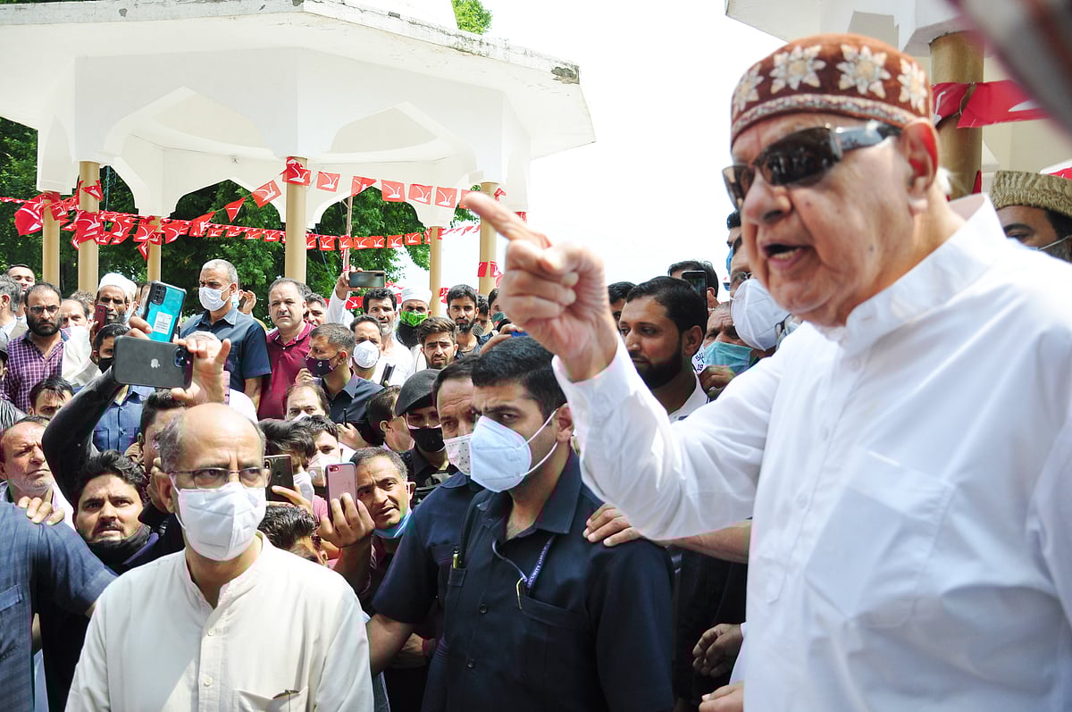 Member of parliament and Jammu and Kashmir National Conference President, Dr. Farooq Abdullah addresses party workers at a gathering on the 21st death anniversary of his mother Begum Akbar Jehan at her grave Hazratbal in Srinagar on Sunday July 11,2021. 