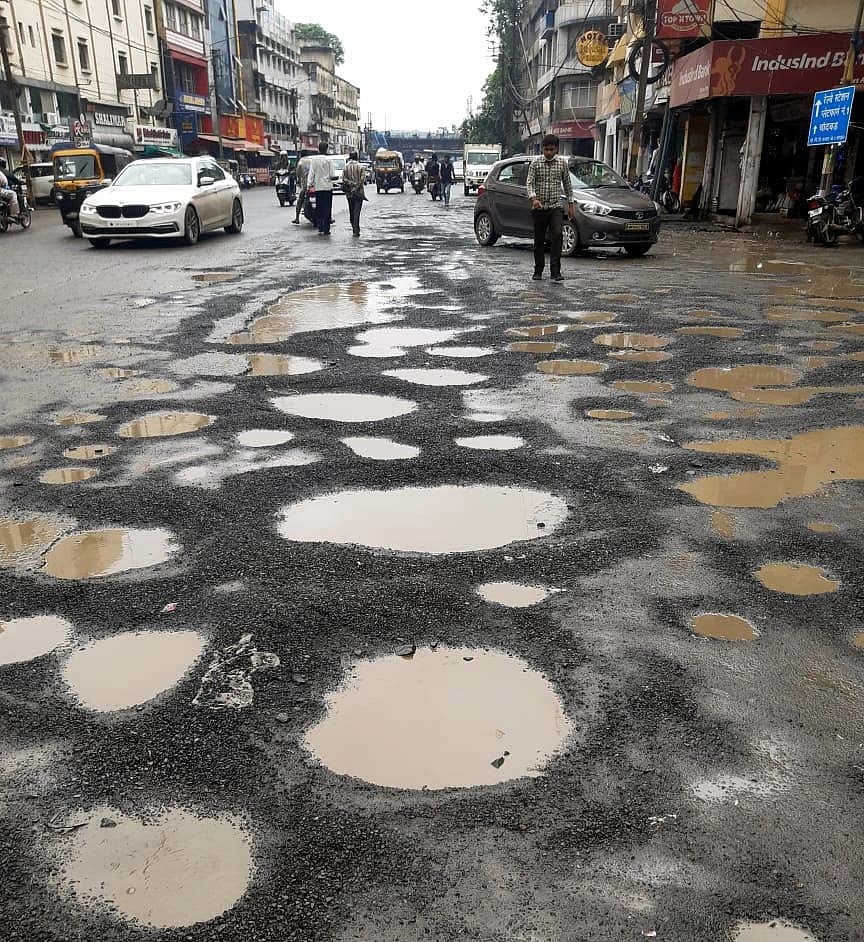 Pothole-riddled road in Bhopal