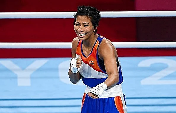Japan, Aug 04 (ANI): Indian boxer Lovlina Borgohain poses after her semifinal bout in the welterweight 64-69kg category, at Tokyo Olympics 2020, in Tokyo on Wednesday.