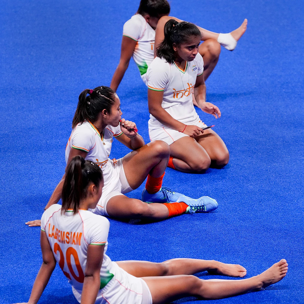 Tokyo: Indian players cool down and stretch after losing 1-2 against Argentina during womens field hockey semifinal match, at the 2020 Summer Olympics, in Tokyo, Wednesday, August 4, 2021.
