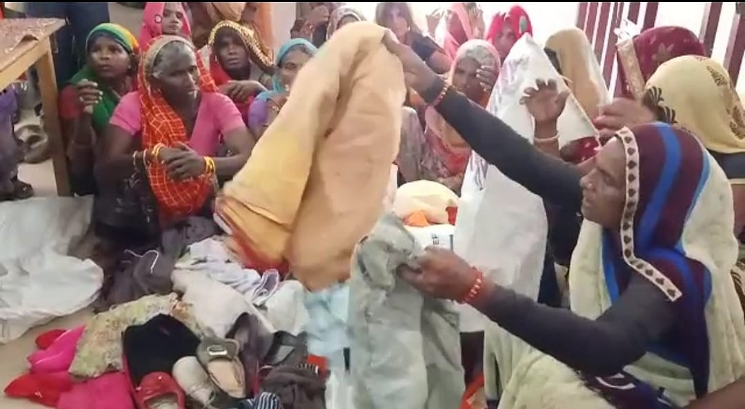 Madhya Pradesh: Angry flood-hit throw away relief packs containing torn clothes
