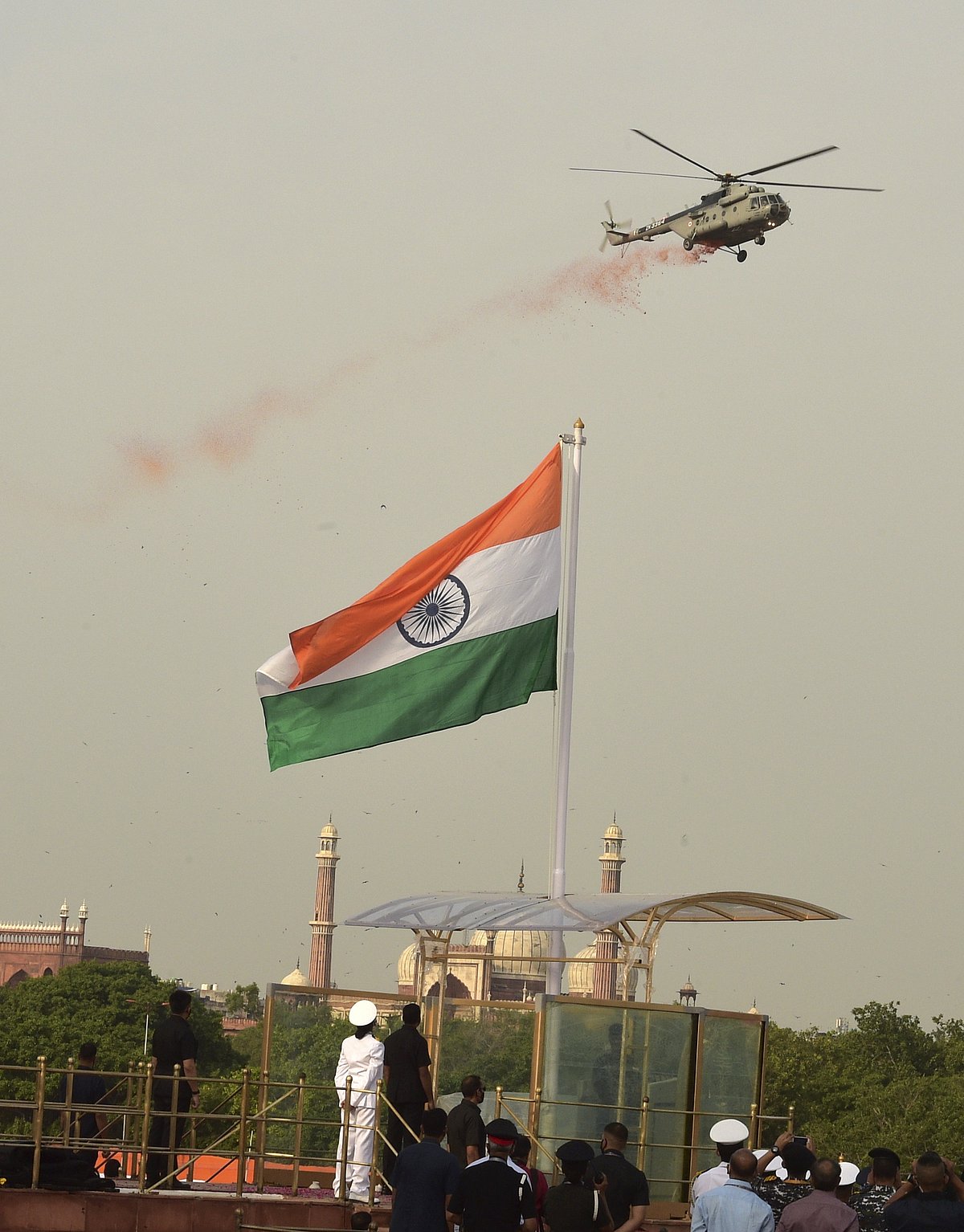 IAF chopper showers flower petals on venue during the full dress rehearsal for the 75th Independence Day celebrations at Red Fort in New Delhi