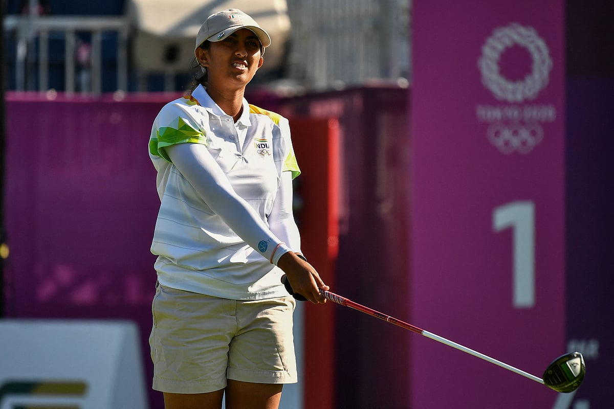 India's Aditi Ashok watches her drive from the 1st tee in round 2 of the women?s golf individual stroke play during the Tokyo 2020 Olympic Games at the Kasumigaseki Country Club in Kawagoe on August 5, 2021.