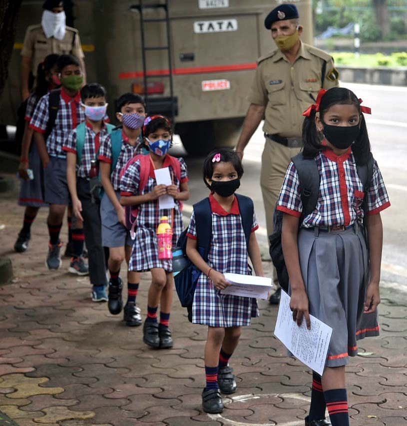 Primary class students return to school after 18 months in Bhopal on Monday