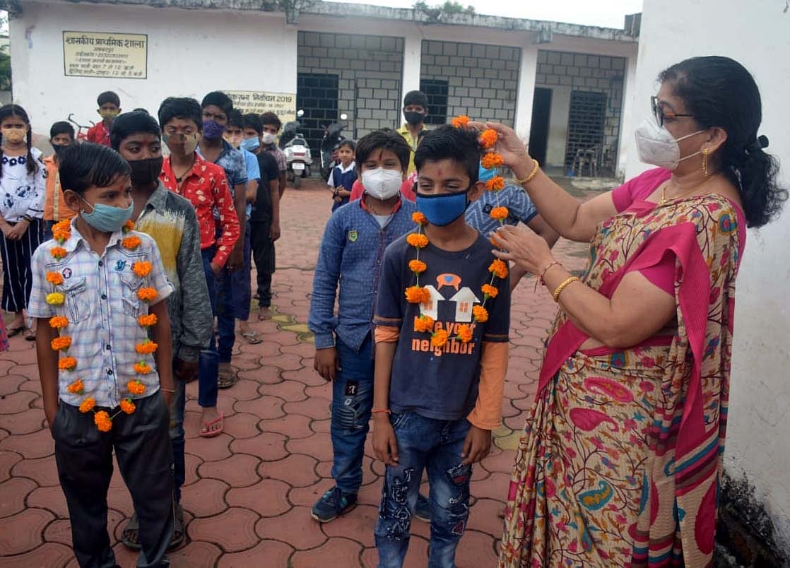 Students being greeting at school on Monday in Bhopal