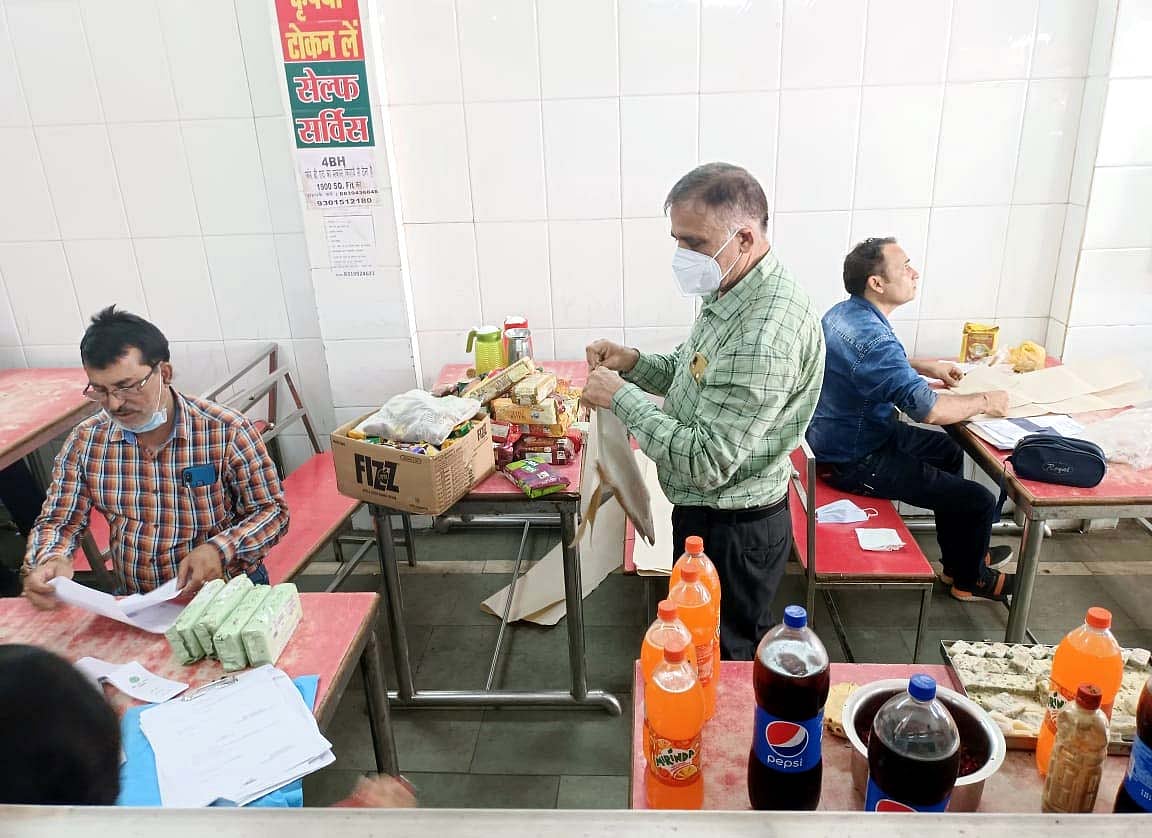 Officials inspecting the eatables the New Famous Juice Corner and Restaurant, in Ashok Garden, Bhopal on Sunday