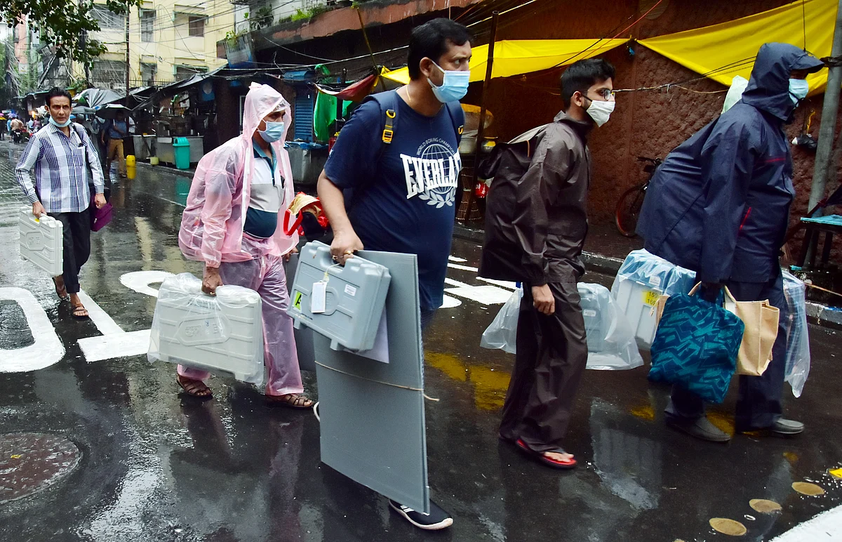West Bengal, Sep 29 (ANI): Polling officials carrying voting materials leave for poll duty amid rains, on the eve of Bhabanipur by-election, in Kolkata on Wednesday.
