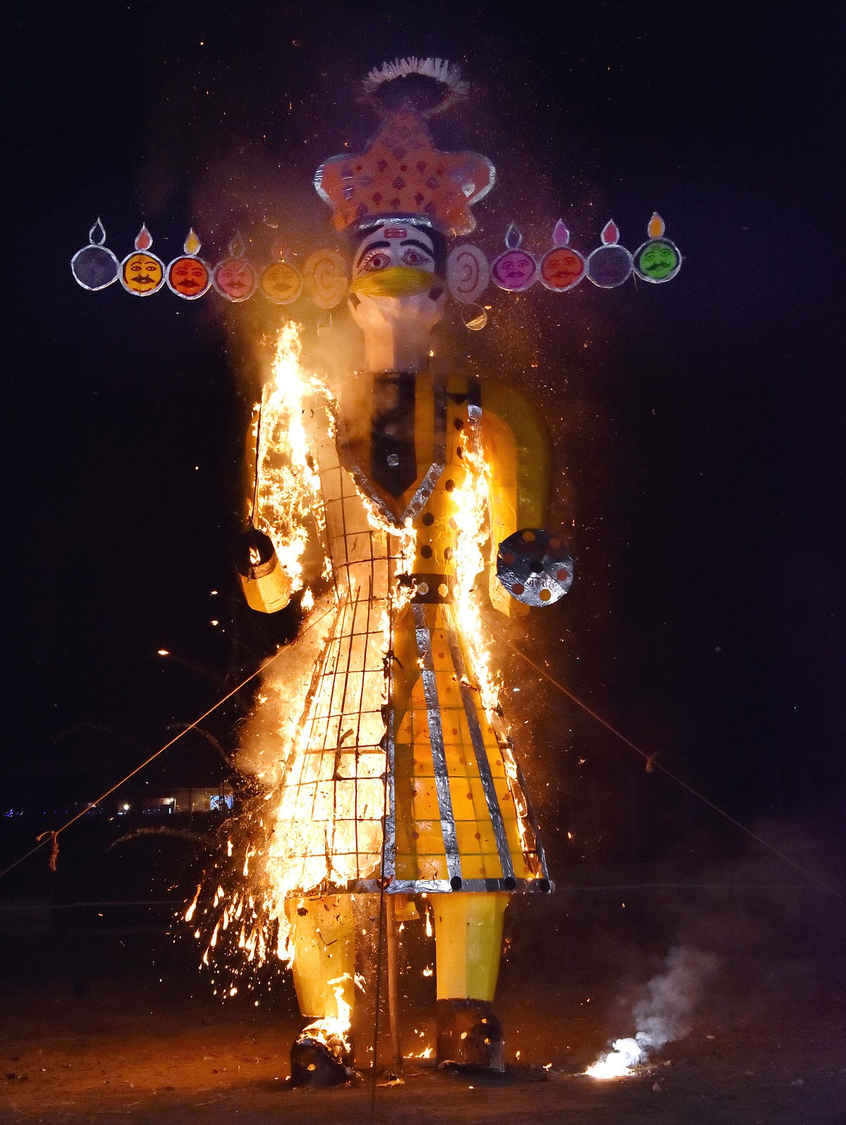 Effigy of Ravana goes up in smoke amidst the chants of Jai Shri Ram in BHopal on Friday.