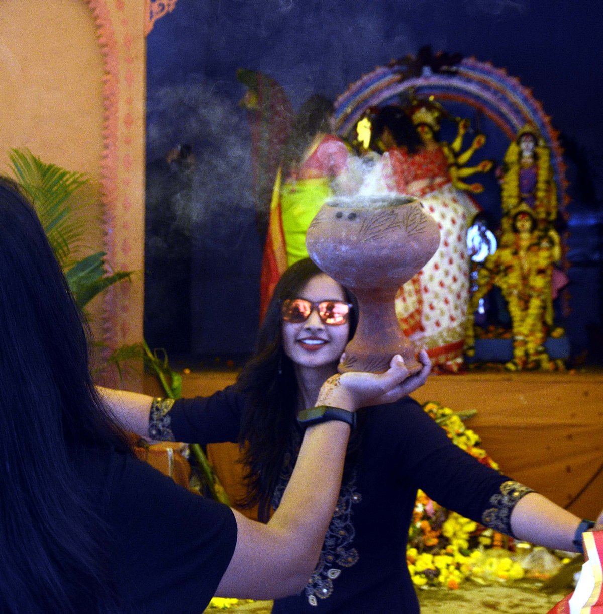 Female members of the Bengali Association Bhopal  participate in Sindoo Khela at Durga Pandal, Kali Bari , TT Nagar Bhopal on Friday