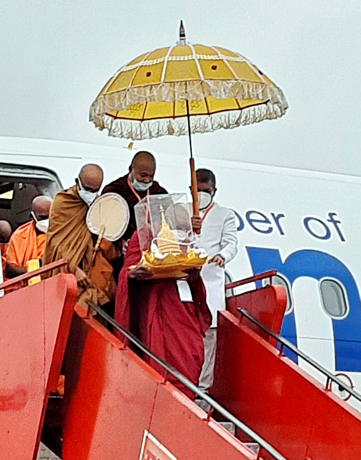 Kushinagar: A group of Buddhist monks deboard the inaugural Sri Lankan Airlines flight after landing at Kushinagar International Airport, 