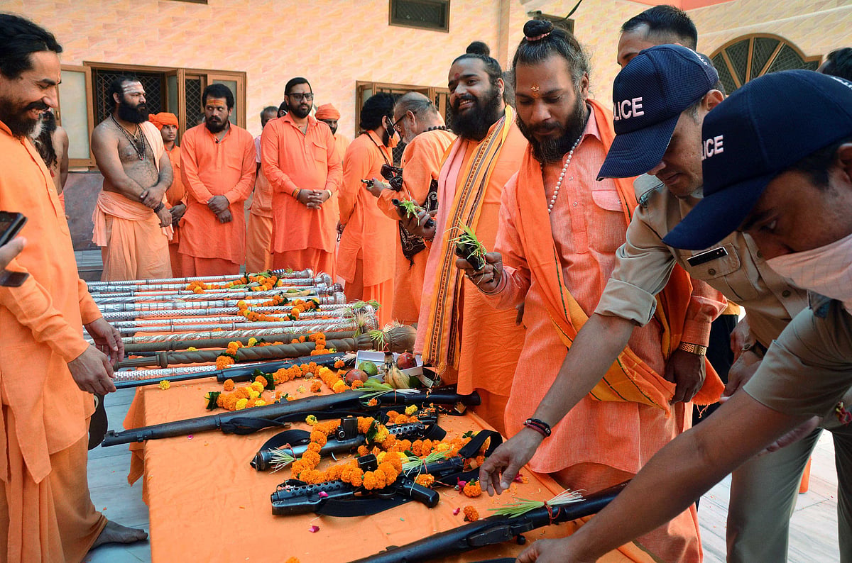 Priests perform Shastra puja on the occasion of Dussehra, at Haridwar Maha Nirmani Akhara, in Haridwar on Friday.