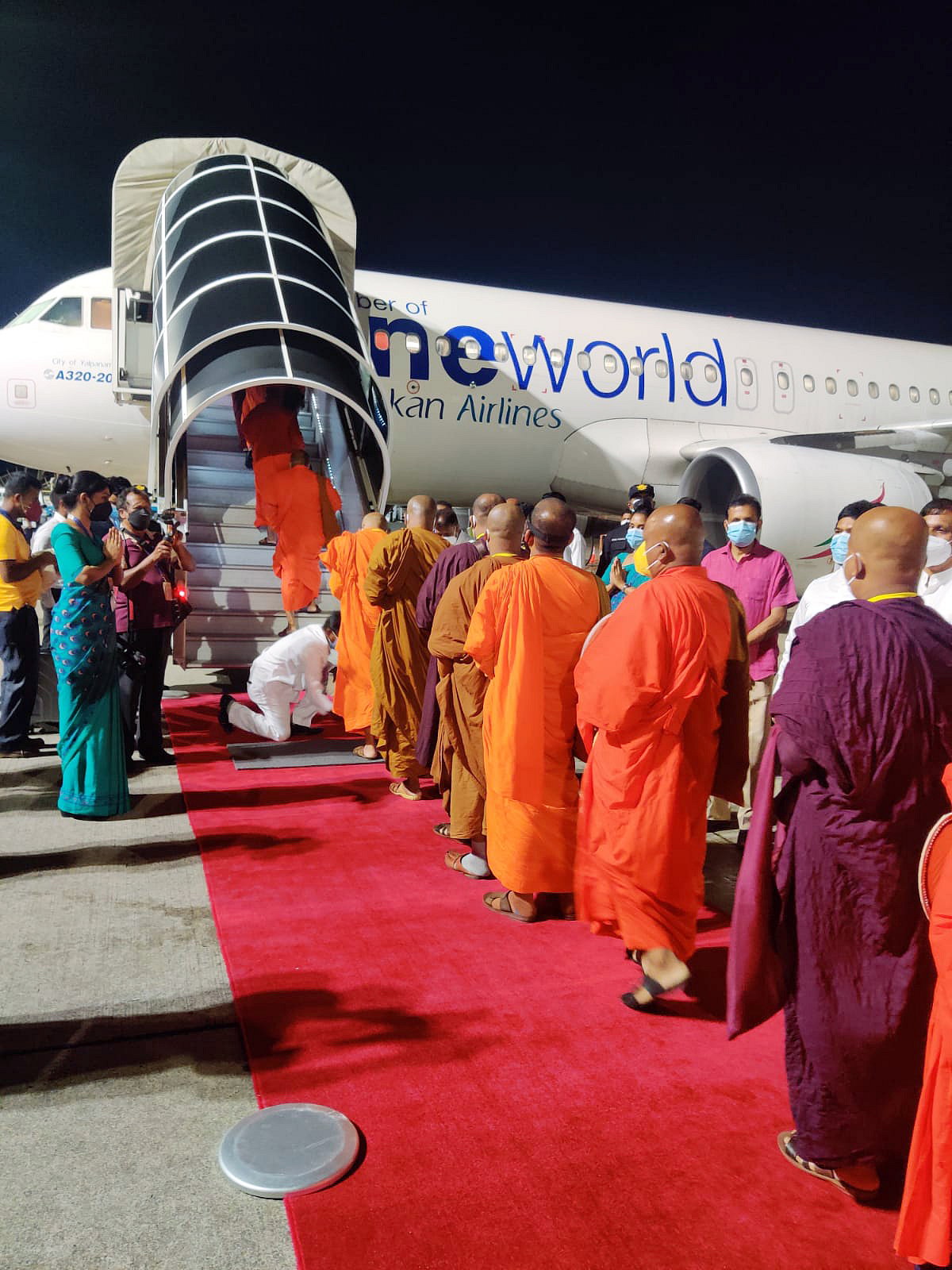 Buddhist monks boarding the inaugural international flight for Kushinagar, in Colombo on Wednesday.