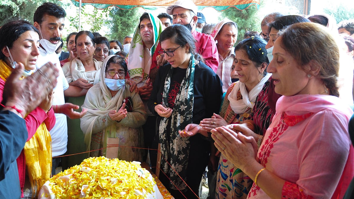 In Photos: Relatives weep at funeral of pharmacist M L Bindroo who was shot dead in Srinagar