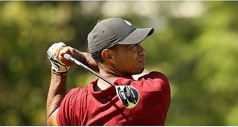 Will he? Won't he? Tiger Woods sparks Masters speculation as he arrives at Augusta National 
