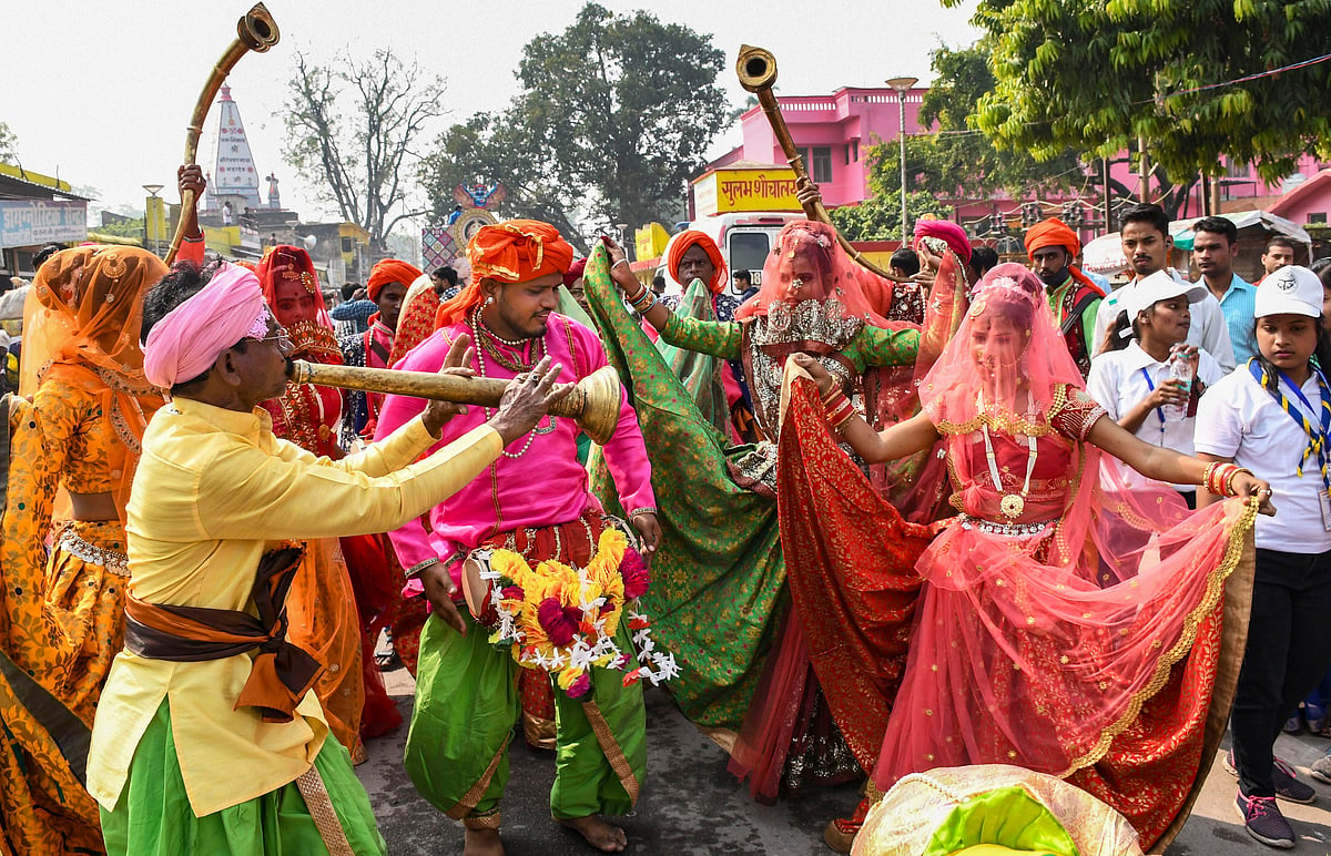 Artists dance during the Deepotsav 2021 function in Ayodhya, Wednesday, Nov. 3, 2021. 