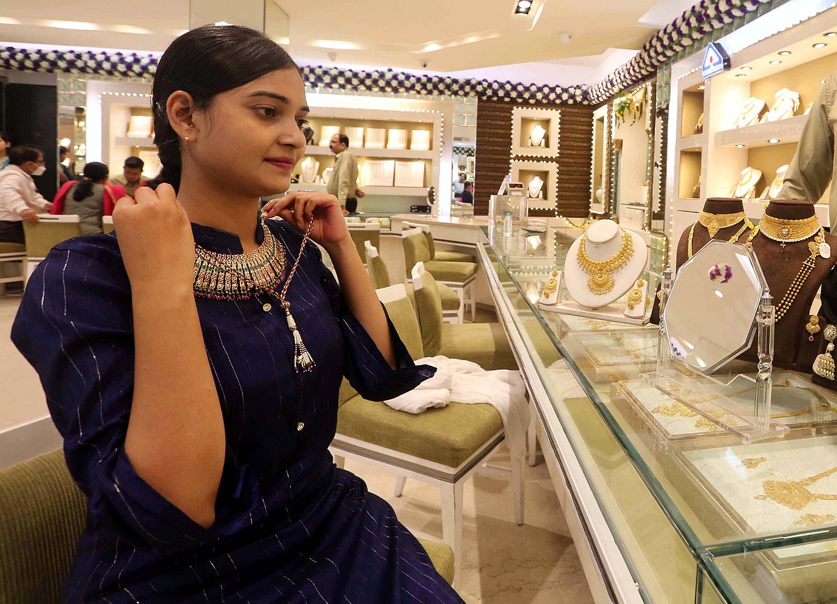 Woman at a jewellery shop on occasion of Dhanteras in Bhopal on Tuesday