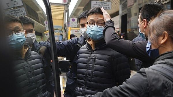 Hong Kong police charge 2 editors of pro democracy news outlet with sedition