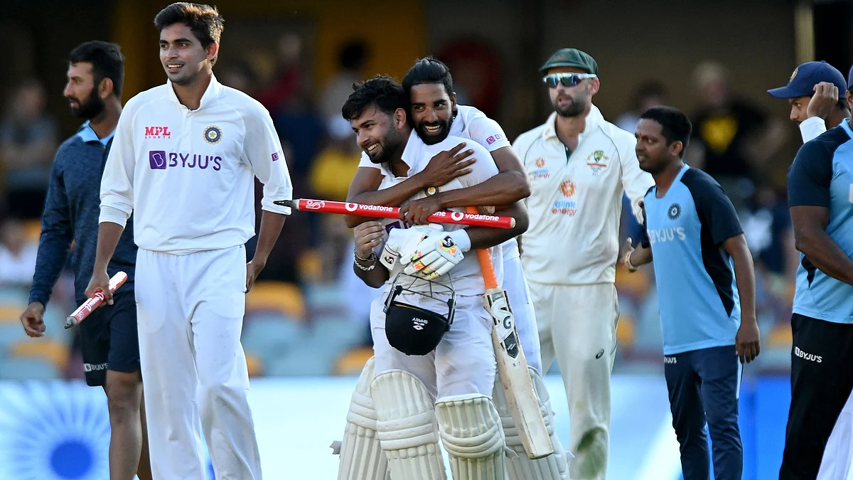 Mohammed Siraj hugs Rishabh Pant (c) after registering a win against Australia at The Gabba. | Photo: Twitter