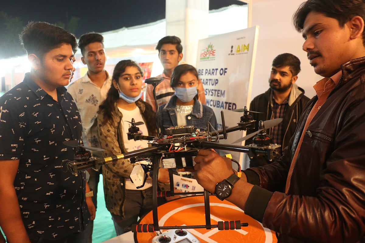 An expert briefs students on drone technology during the Expo at the SGSITS.