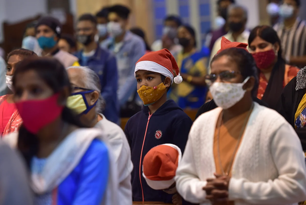 Bengaluru: Devotees during a Maas prayer at St Basilica Church, on the eve of Christmas festival, in Bengaluru, Friday, Dec. 24, 2021.