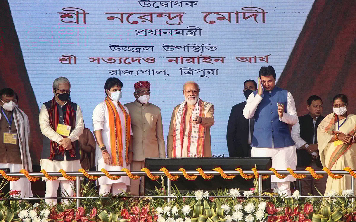 Agartala: Prime Minister Narendra Modi inaugurates a new Integrated Terminal building at the Maharaja Bir Bikram (MBB) airport, in Agartala, Tuesday, Jan. 4, 2022. Union Minister for Civil Aviation Jyotiraditya Scindia, Tripura Governor Satyadeo Narain Arya and Chief Minister Biplab Kumar Deb are also seen.  | (PTI Photo)