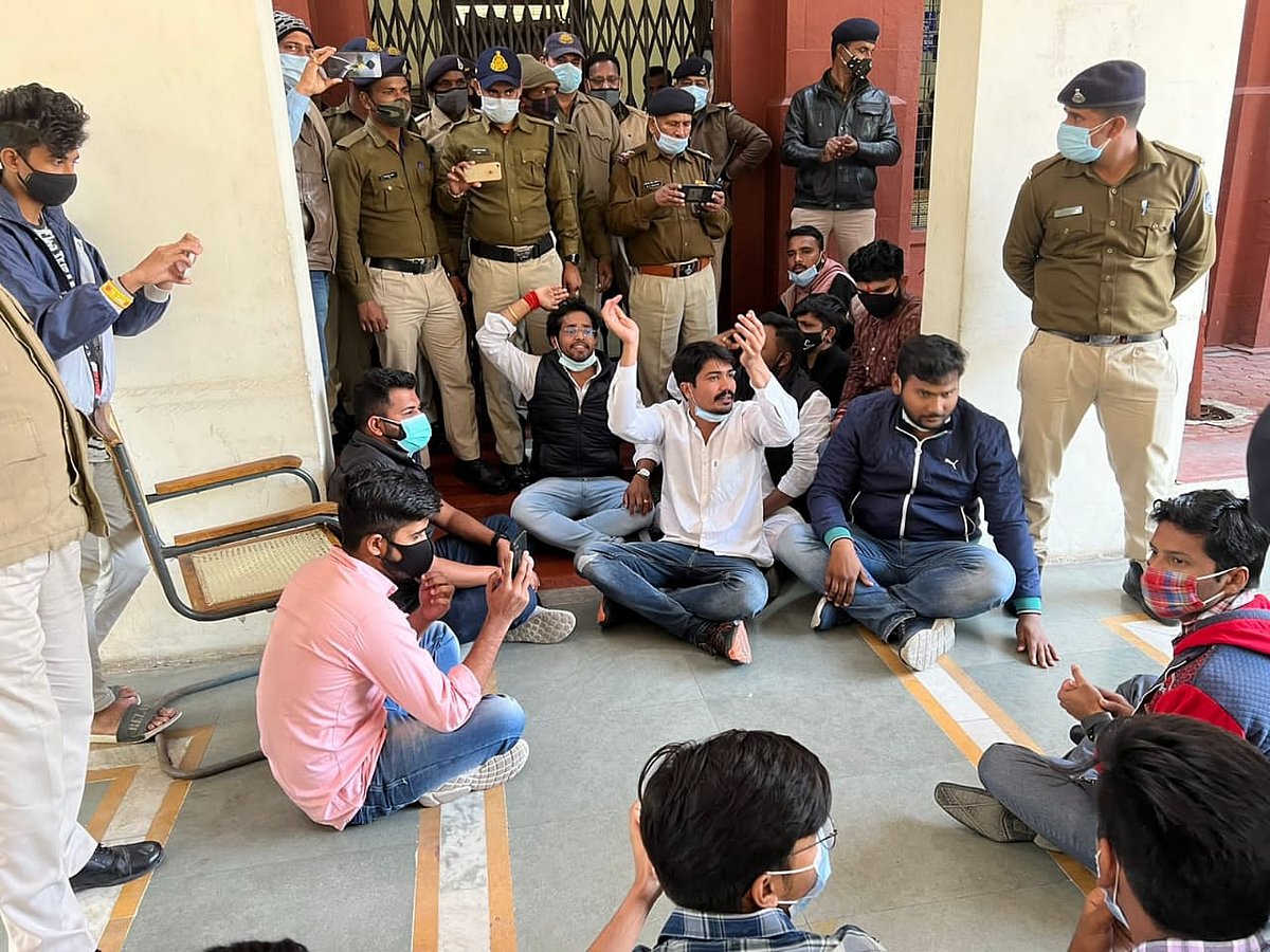  NSUI activists staging a sit-in in protest against offline exams on RNT Marg campus of DAVV on Friday. | 