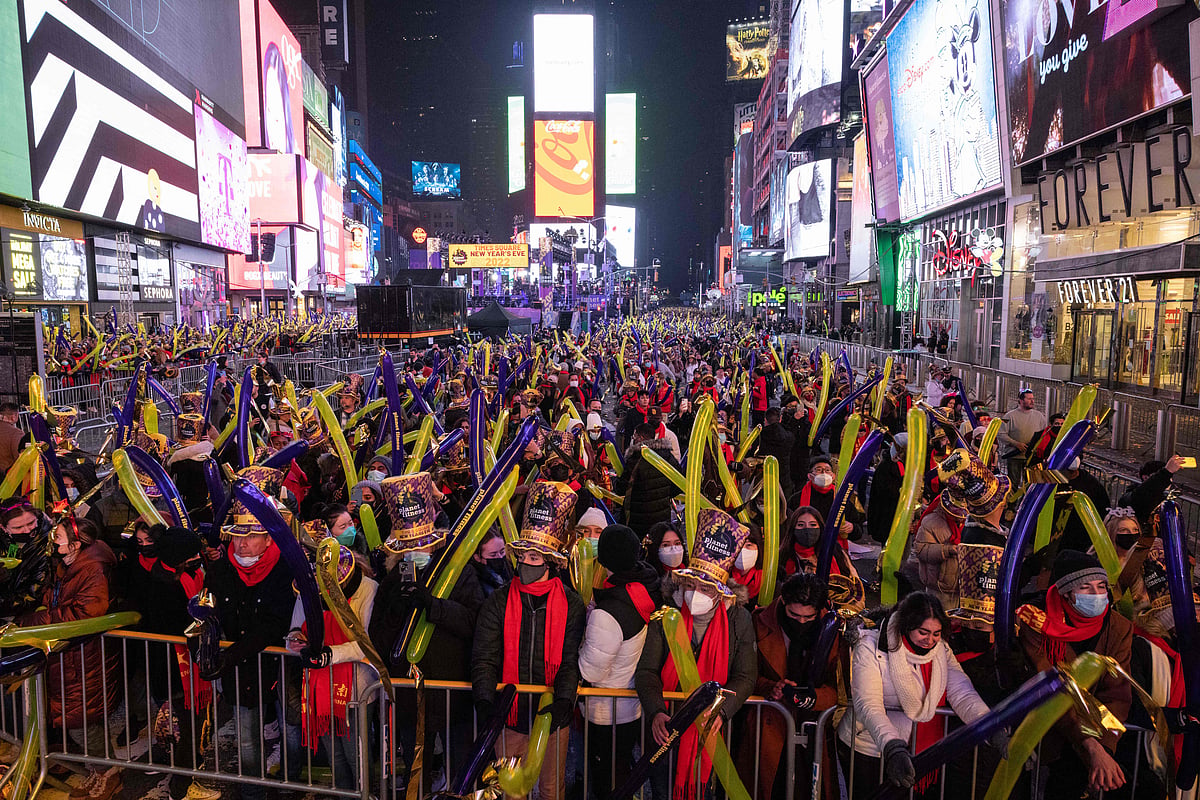 People gather during New Years Eve celebrations at Times Square in New York City on December 31, 2021. 