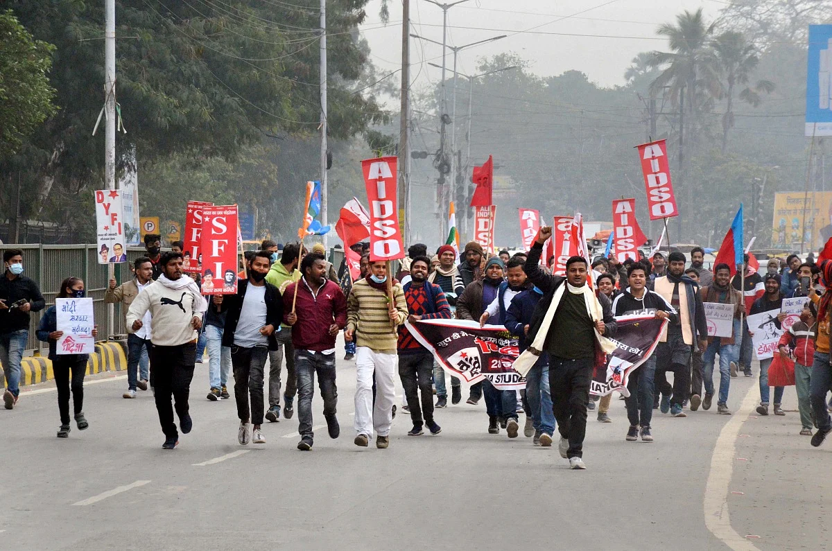 AISA, AIDSO, SFI, NSUI and AISF activists take part in a protest march against alleged erroneous results of the Railway Recruitment Boards Non-Technical Popular Categories (RRB NTPC) exam, during Bihar bandh, in Patna, Friday, Jan. 28, 2022