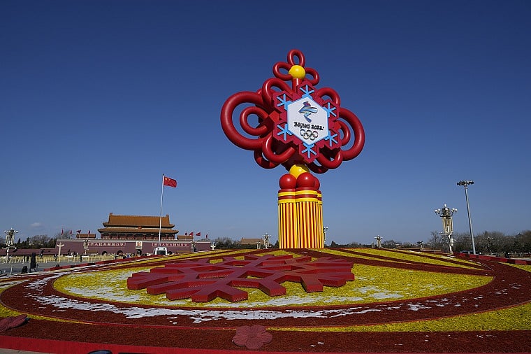 A 17-meter-high Olympics-themed decoration shaped like a Chinese knot is placed at Beijing’s Tian’anmen Square to welcome the Spring Festival holiday and the Beijing Winter Olympics.