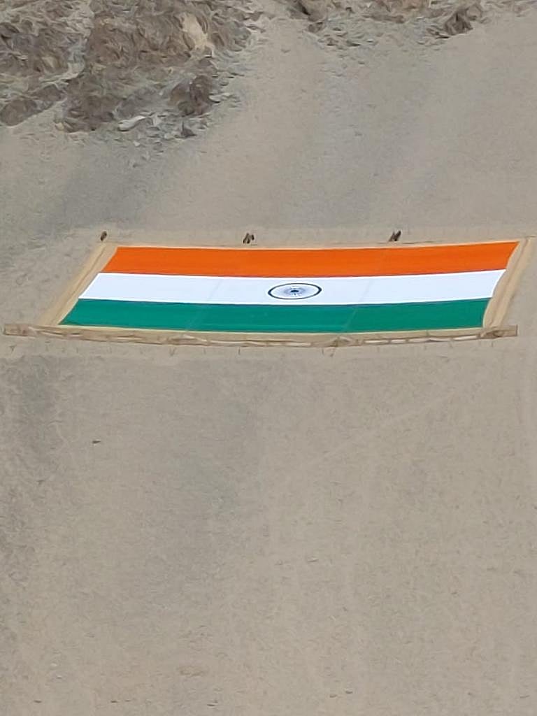 Army Day 2022: 225 feet long, 150 feet wide monumental national flag made of khadi to be displayed at Longewala tomorrow | PIB Photo