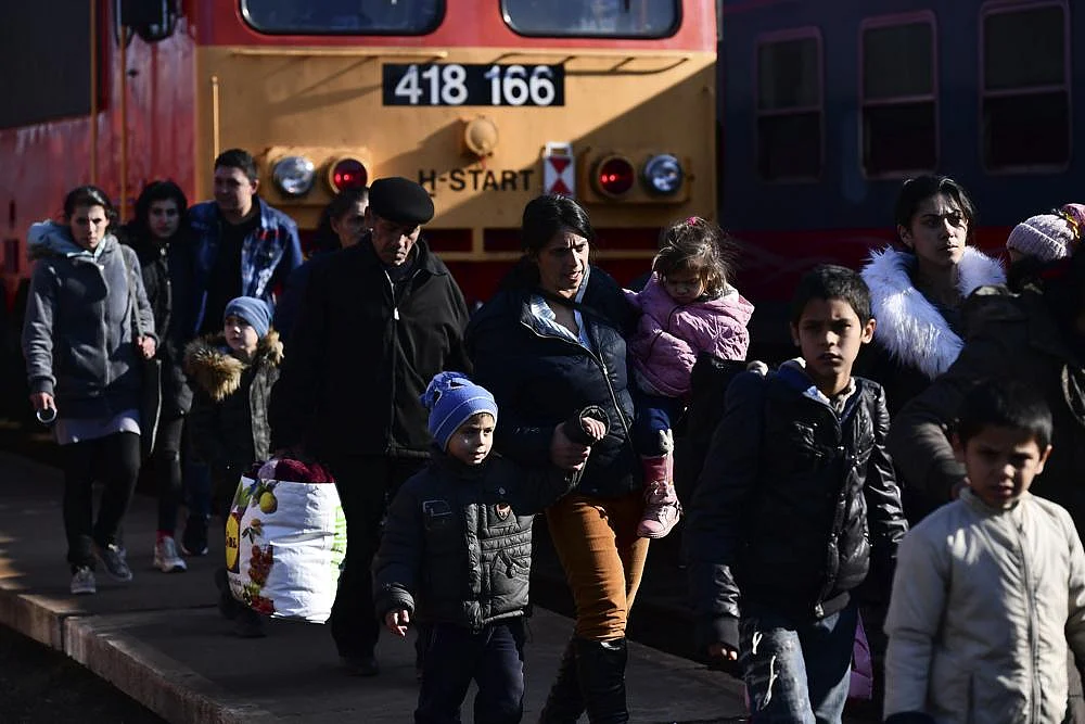 Refugees fleeing conflict from neighboring Ukraine arrive to Zahony, Hungary. | AP