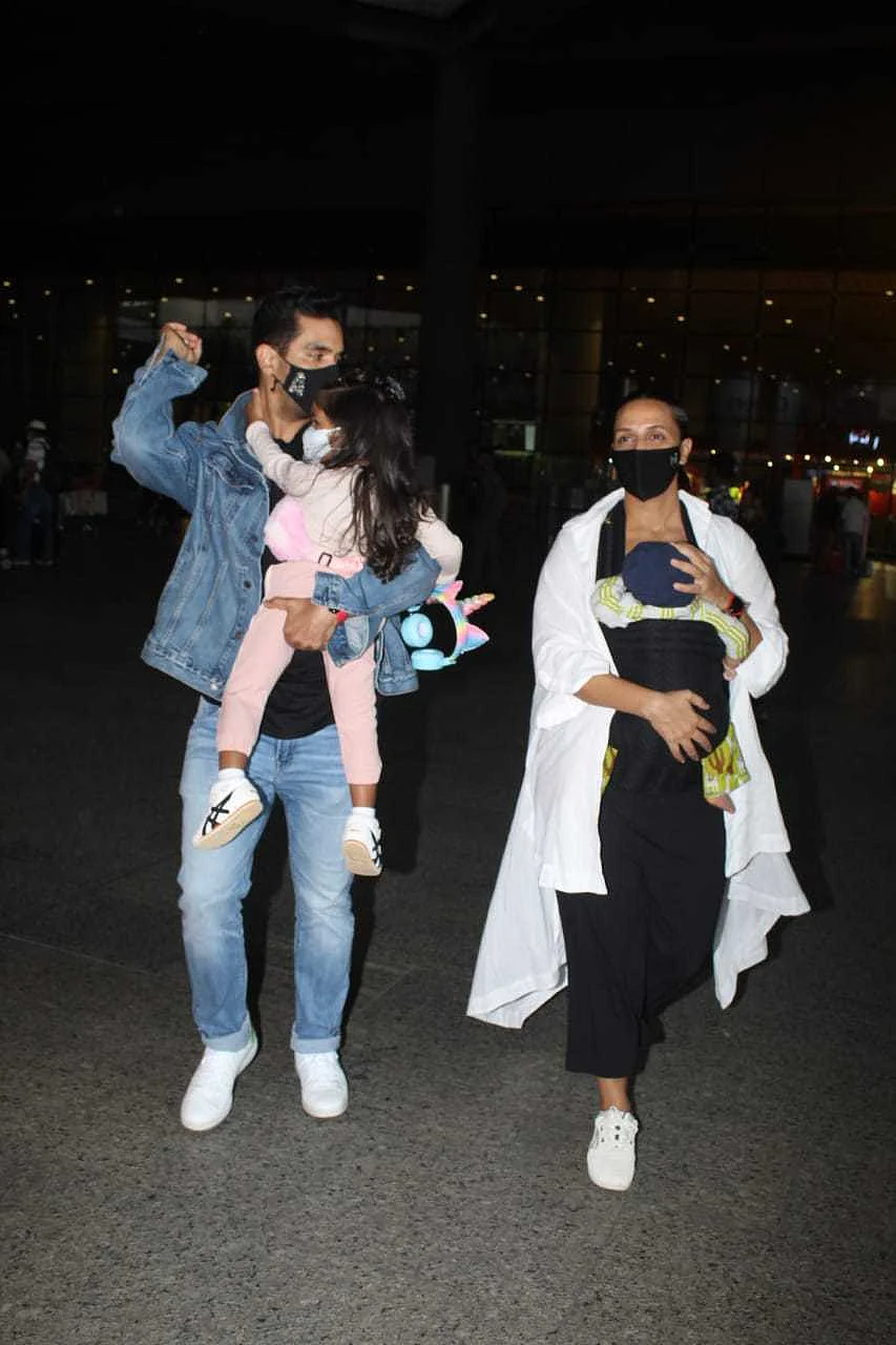 Neha Dhupia and family