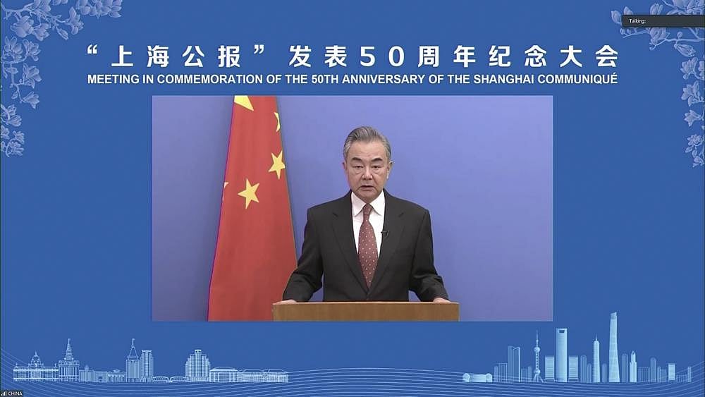 Chinese Foreign Minister Wang Yi delivers an address during a forum marking the 50th anniversary of the Shanghai Communique signed during the icebreaking 1972 visit to China by President Richard Nixon in Shanghai, on Monday | AP