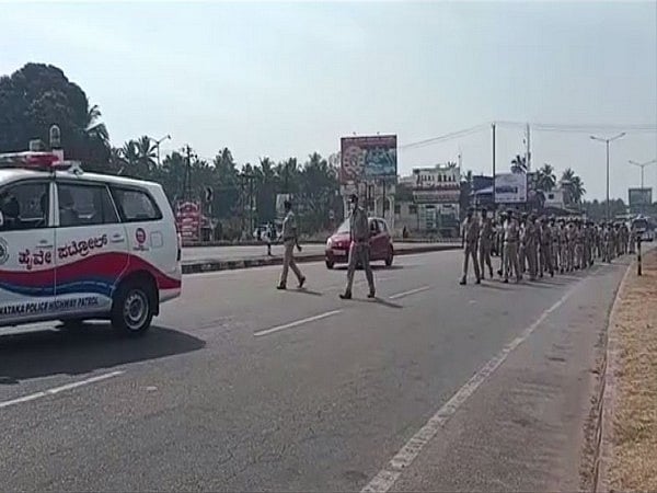 Karnataka hijab row: Police personnel, security forces hold flag march in Udupi ahead of school reopening