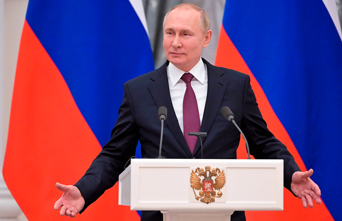 Moscow: Russian President Vladimir Putin gestures speaking during a joint news conference with German Chancellor Olaf Scholz following their talks in the Kremlin in Moscow, Russia, Tuesday, Feb. 15, 2022. Putin says Moscow is ready for security talks with the U.S. and NATO, as the Russian military announced a partial troop withdrawal from drills near Ukraine ??? new signs that may suggest a Russian invasion of its neighbor isnt imminent despite snowballing Western fears.  | AP/PTI