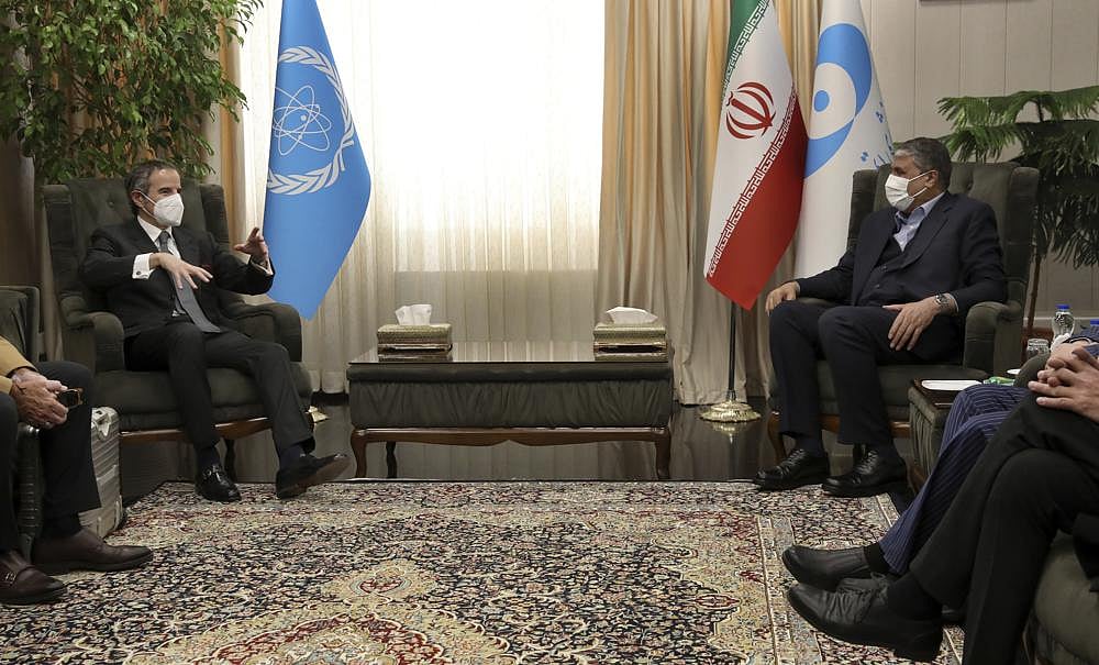 International Atomic Energy Organization, IAEA, Director General Rafael Mariano Grossi, left, speaks with Head of Atomic Energy Organization of Iran Mohammad Eslami during their meeting in Tehran, on March 5, 2022 | AP