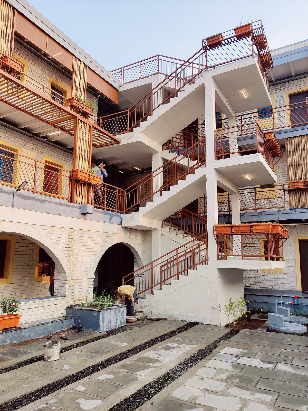 Slum residents in Ahmednagar receive  new homes designed with Community Design Agency, Snehalaya under PMAY