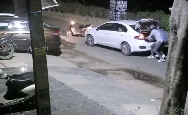 WATCH: Businessman looted at gunpoint in middle of road in Delhi's Rohini, act caught on CCTV 