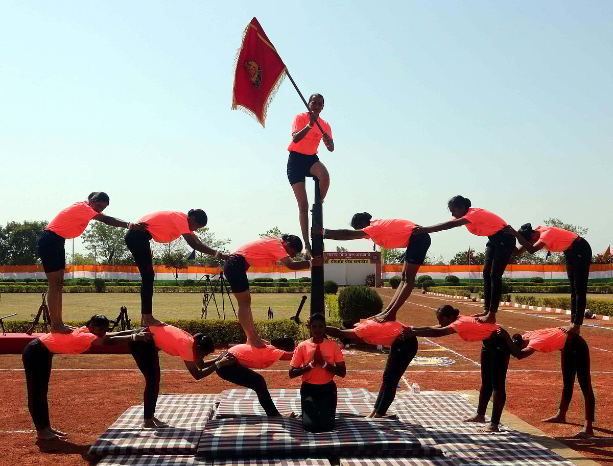 Personnel showing daredevil stunts at the passing out parade Sashastra Seema Bal Academy in Bhopal  on Tuesday