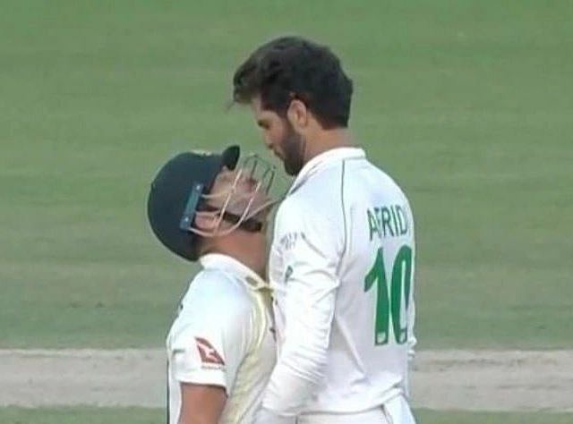 Australia’s David Warner (L) and Pakistan’s Shaheen Shah Afridi | 