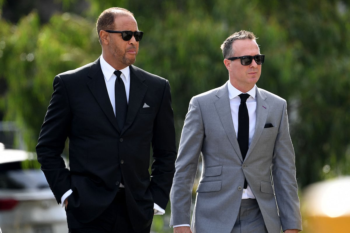 Former Australian cricketer Ric Lewis (L) and former England cricketer Michael Vaughan (R)