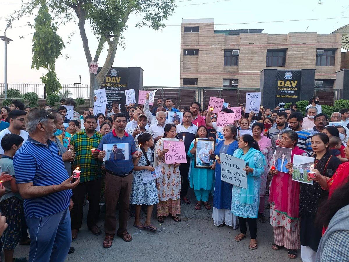 Family and friends of Kartik Vasudev hold a candle march in Ghaziabad | 