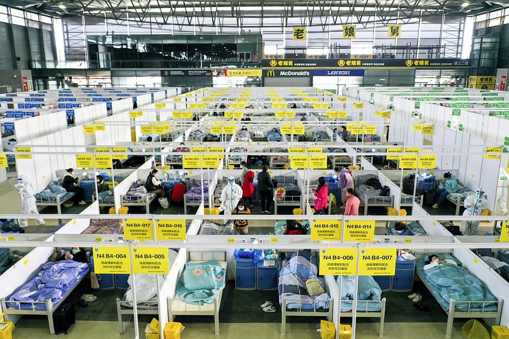 In this photo released by China's Xinhua News Agency, people with mild and asymptomatic cases of COVID-19 quarantine at the Shanghai New International Expo Center in Shanghai, on Friday, April 1, 2022 | AP