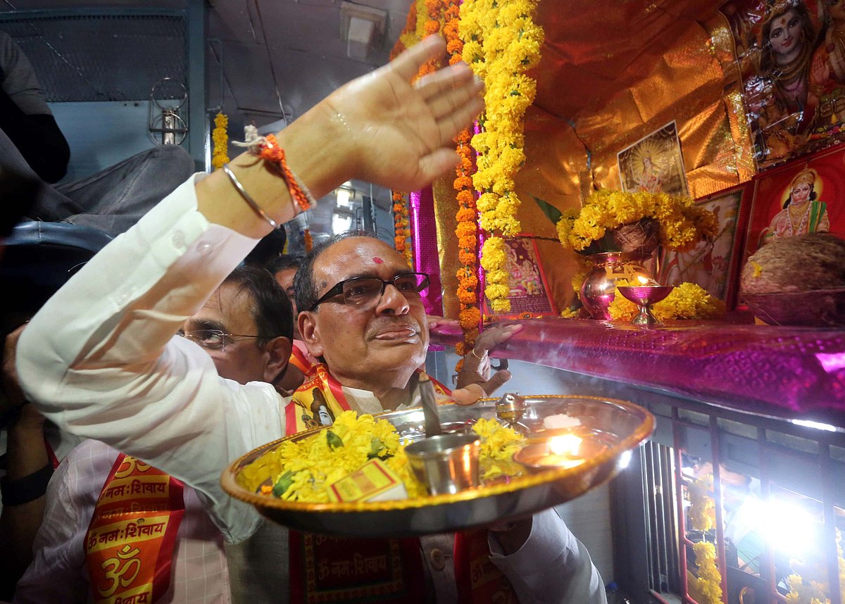 CM offering prayer ahead of flagging off special train 