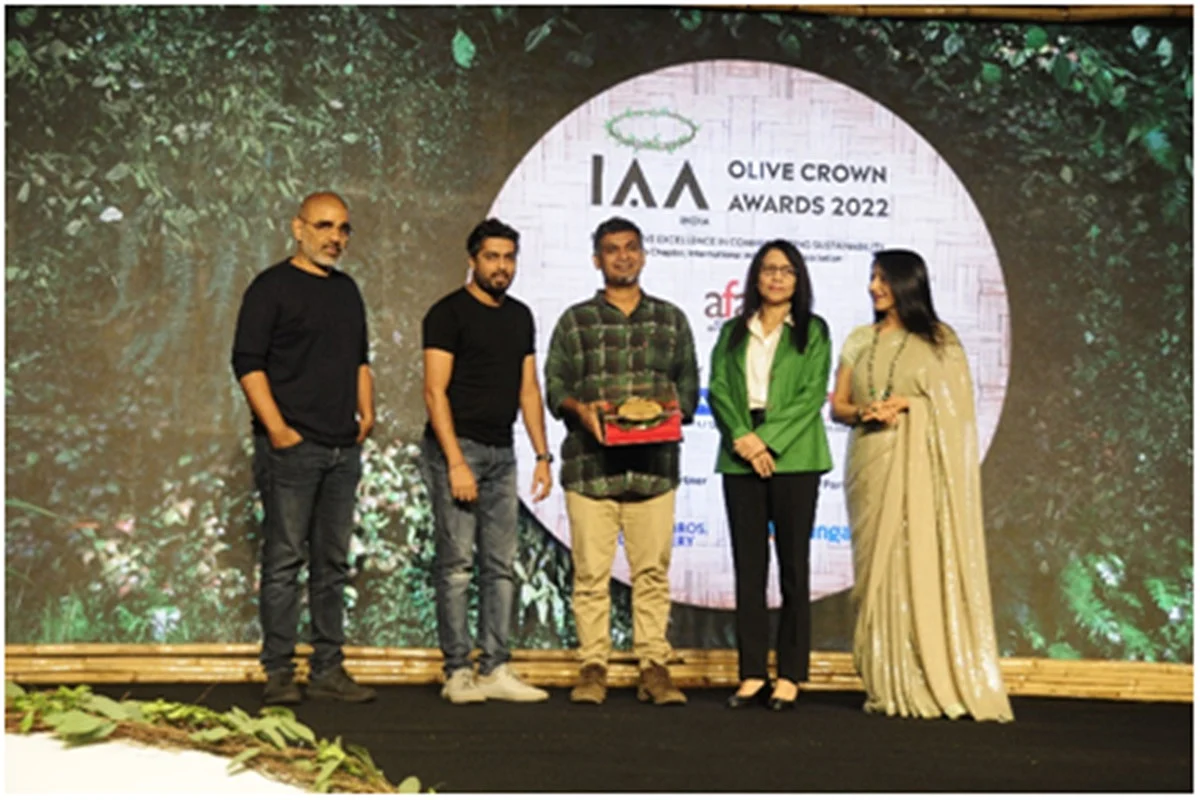 Rohan Joseph and Vallabh Yeolkar from Madison BMB receiving the trophy for their winning ‘Save the Soil’ campaign