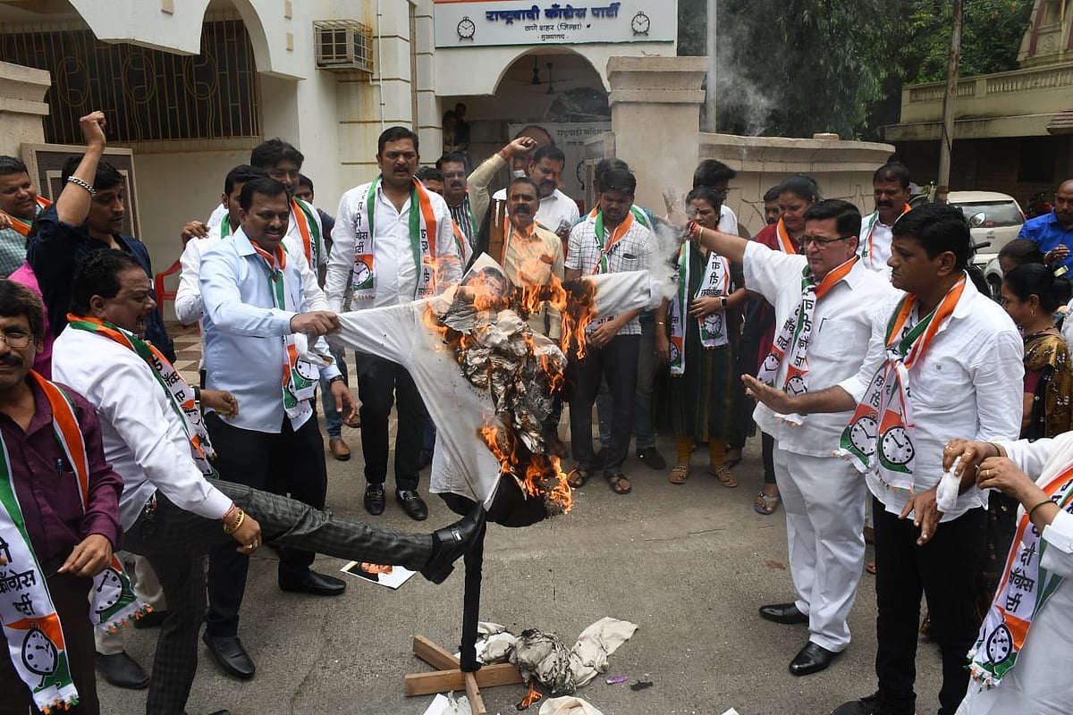 NCP activists burn Chandrakant Patil effigies in Thane for his remark on Supriya Sule