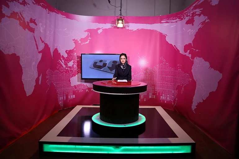 Basira Joya, 20, presenter on a news programme, records a broadcast at the Zan TV station (women's television) in Kabul, Afghanistan in 2017 | AP