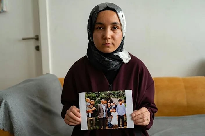 Uighur activist Nursimangul Abdureshid has not heard from her parents and brothers in years  | AFP